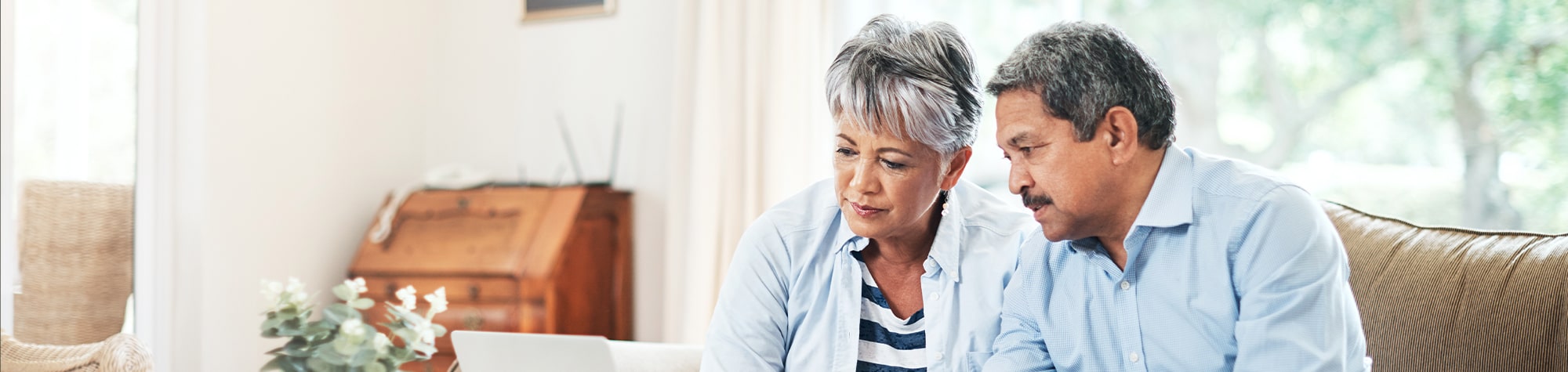 A senior couple discussing possible emergencies in their retirement